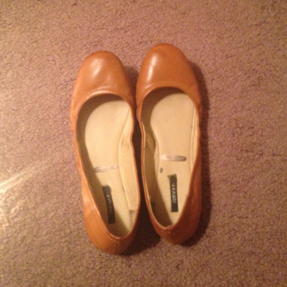 Brown leather flats