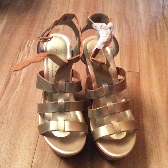 Champagne gold wedges, never worn