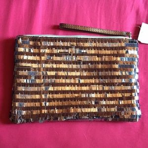 Silver wristlet clutch