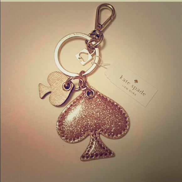 New Kate Spade rose gold glittery Spade keychain.