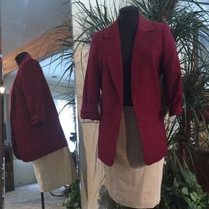 Boyfriend cut maroon blazer.
