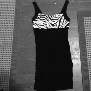 A black and zebra short party dress.