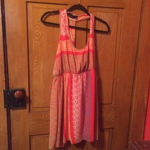 Warm colored patterned dress with open back