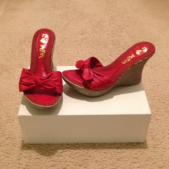 Red wedge sandals.