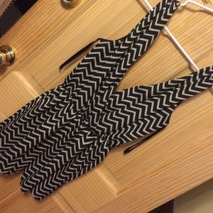 Honey Punch romper in chevron, black and taupe