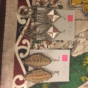 In pink earrings set of two never worn