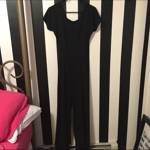 Black Jumpsuit with cutout cross-cross back.