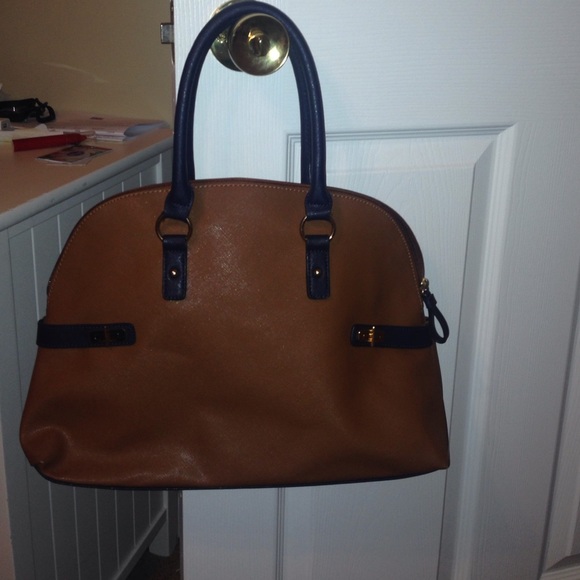 Tommy Hilfiger tan and navy purse.