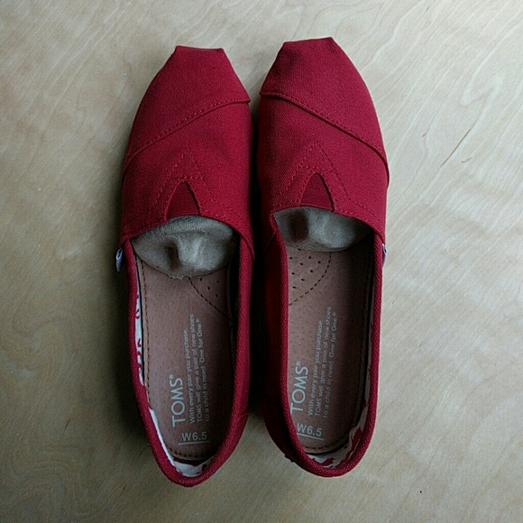 Mint condition TOMS canvas slip on - Red