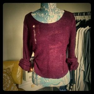 Distressed crop sweater