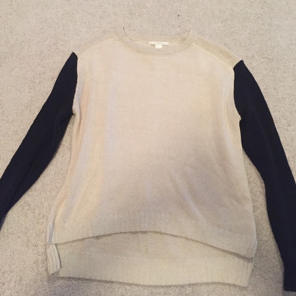 cream and black sweater
