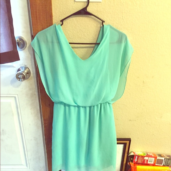 A teal dress , great material , not stained .
