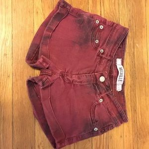 Red/Maroonish shorts.