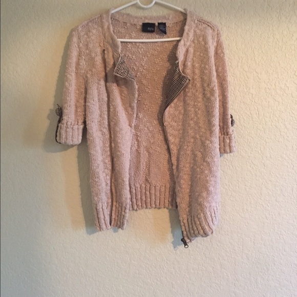 Cream colored sweater with blue and brown