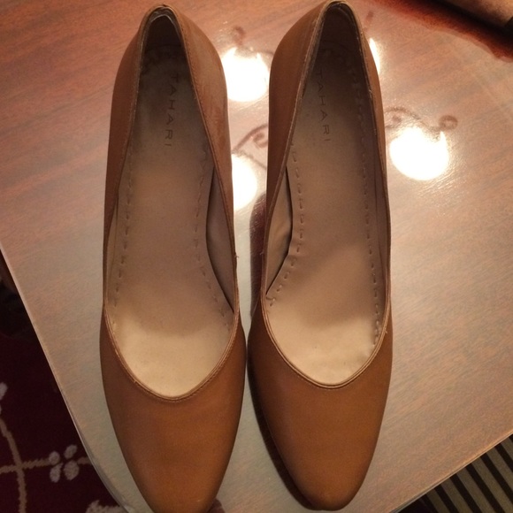 Tahari tan four inch heels.  Never worn.