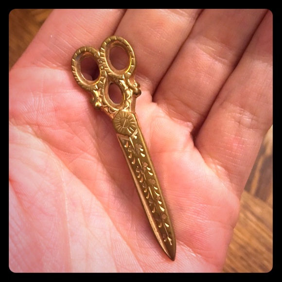 Beautiful gold scissors pendant