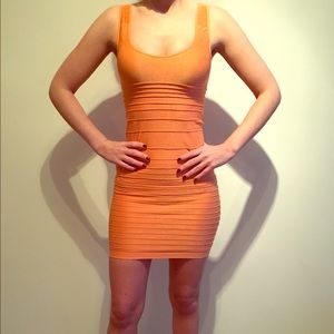 Bebe bright orange bodycon dress with open back