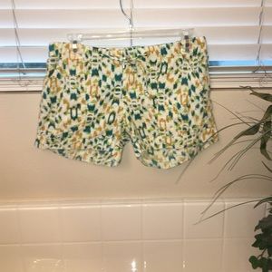 teal and gold shorts