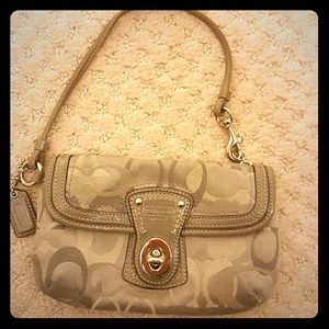 Coach signature silver wristlet