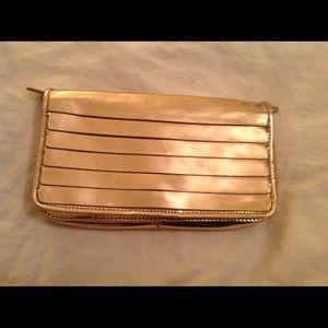 Cole Haan Maria Sharapova rose gold clutch