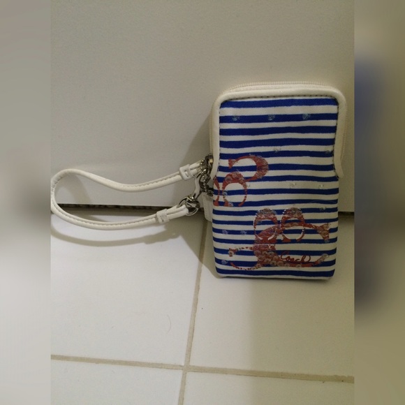 Blue and White striped Coach Wristlet