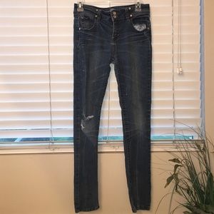 medium washed ripped skinny jeans