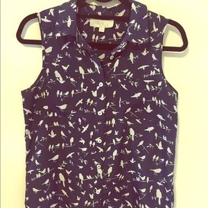 Navy sleeveless button up shirt