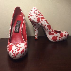 Red and white splatter paint heels