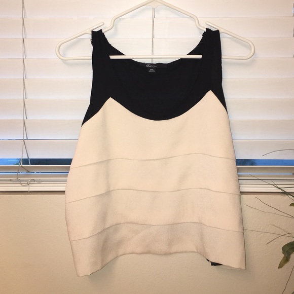 cream and black ruffled blouse