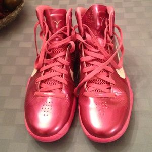 Pink nike high top basketball shoes