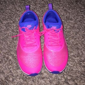 Hot pink nike shoes