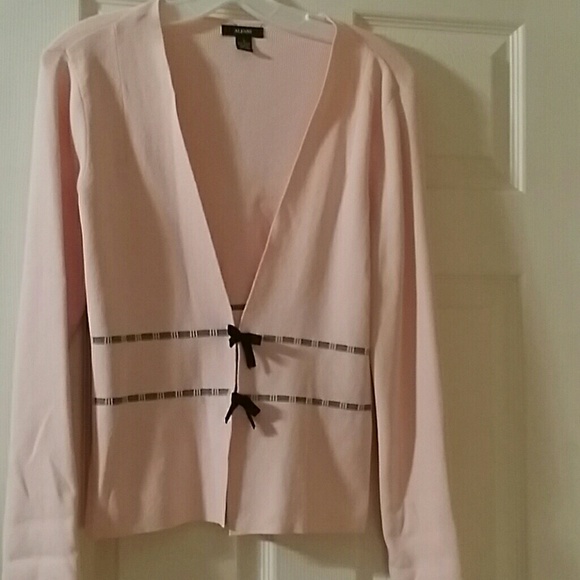 Ribbed pink cardigan.