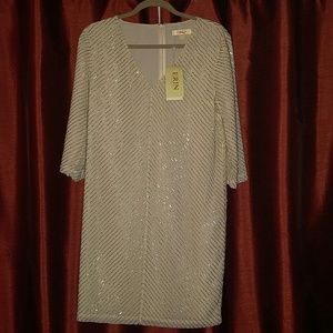 Beautiful V neck beaded ivory dress