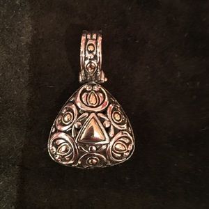 Enhancer silver with goldstone accent