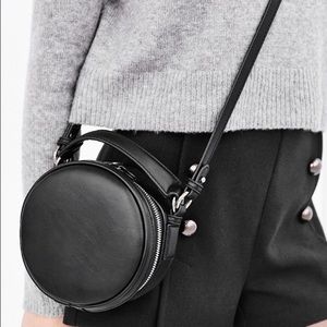 Cooperative Round Crossbody bag