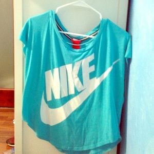 Size small light blue nike shirt