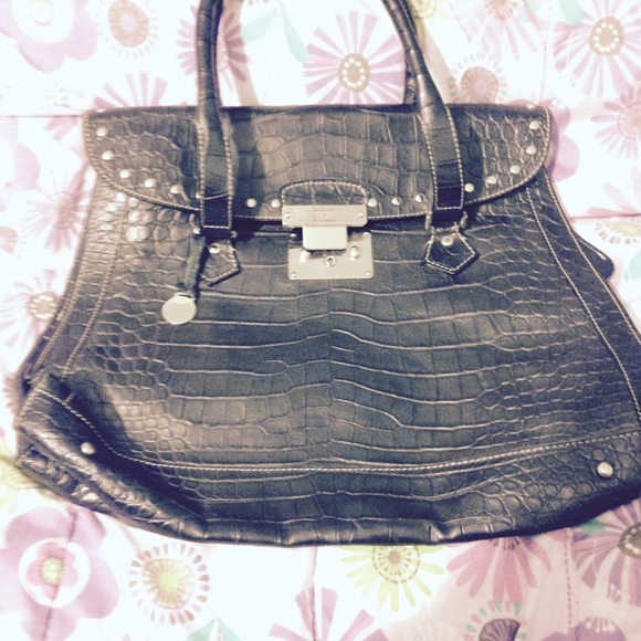 2 for $100
- Dooney & Bourke tote