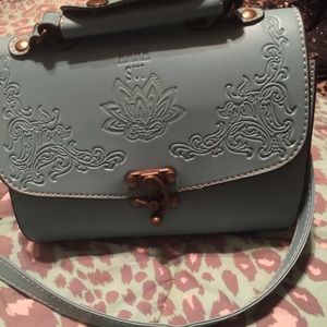 Antique, very cute cross body bag for a night out.