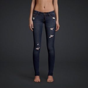 Distressed dark jeans
