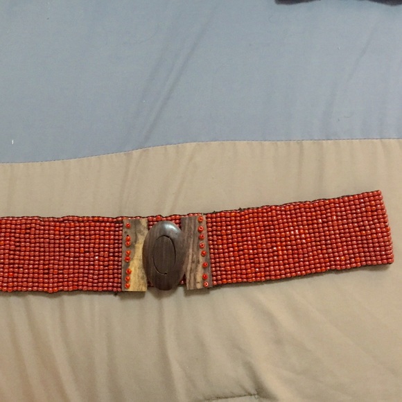 Orange beaded and wood belt