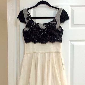 Evening dress with black lace