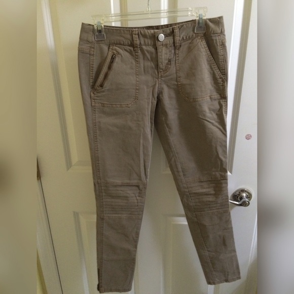 Light brown pants with zippers