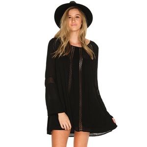 Volcolm black dress