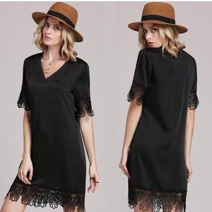 Super cute little black dress with v neck & lace