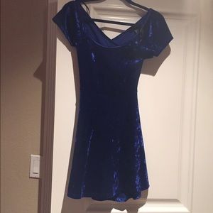 Velvet a-line dress with criss cross back.