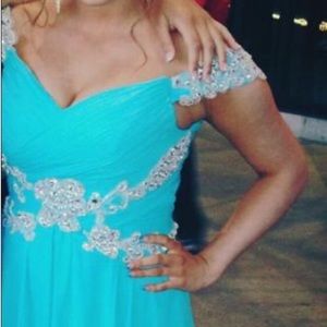 Long blue prom dress.