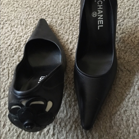 Authentic Chanel black pumps with camellia flower