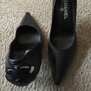Authentic Chanel black pumps with camellia flower