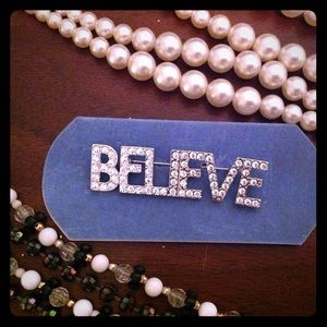 Sparkly BELIEVE brooch pin