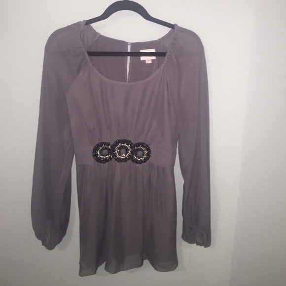 Long sleeved gray blouse with beaded belt